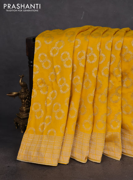 Banarasi silk saree yellow with allover silver & gold zari woven buttas and gotapatti work pallu