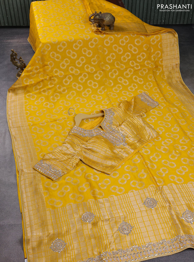 Banarasi silk saree yellow with allover silver & gold zari woven buttas and gotapatti work pallu