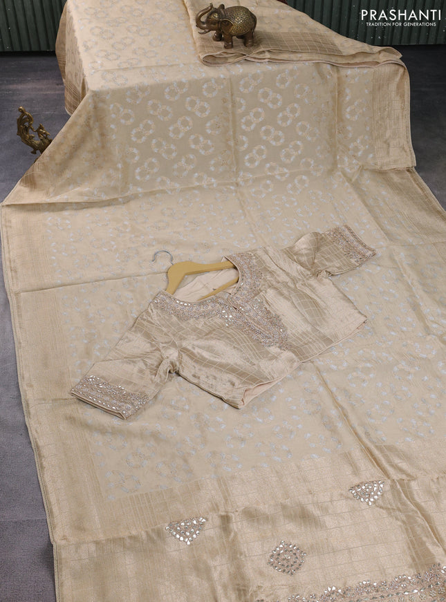 Banarasi silk saree cream with allover silver & gold zari woven buttas and gotapatti work pallu