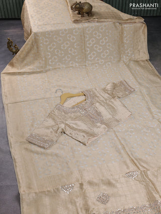 Banarasi silk saree cream with allover silver & gold zari woven buttas and gotapatti work pallu