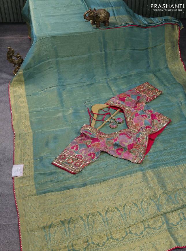Banarasi silk saree pastel green and multi colour with plain body and zari woven border