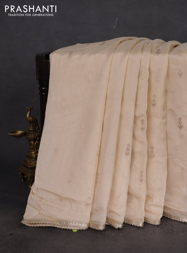 Munga tussar silk saree cream with zari woven buttas and lace work border
