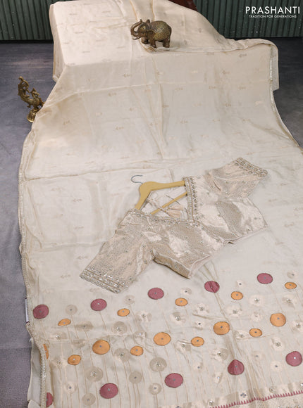 Munga tussar silk saree cream with zari woven buttas and lace work border