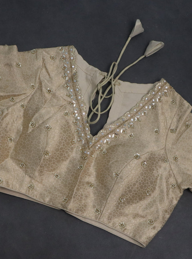 Munga tussar silk saree cream with zari woven buttas and lace work border