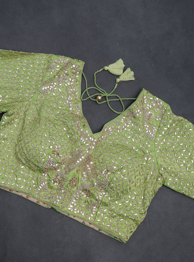 Tissue silk saree light green with allover silver & gold zari weaves and zari woven border