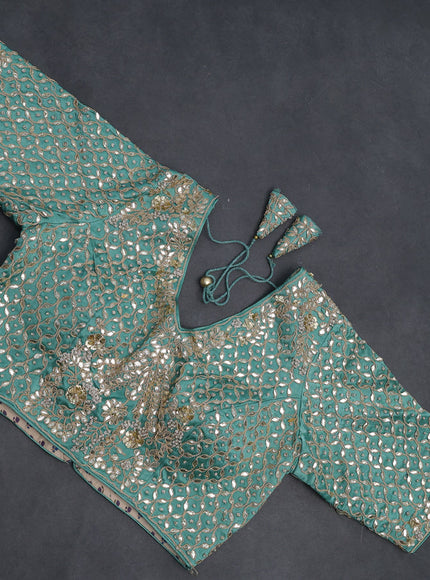 Tissue silk saree pastel green shade with allover silver & gold zari weaves and zari woven border