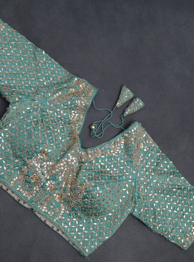 Tissue silk saree pastel green shade with allover silver & gold zari weaves and zari woven border