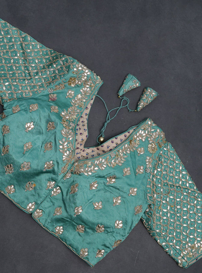 Tissue silk saree pastel green shade with allover silver & gold zari weaves and zari woven border