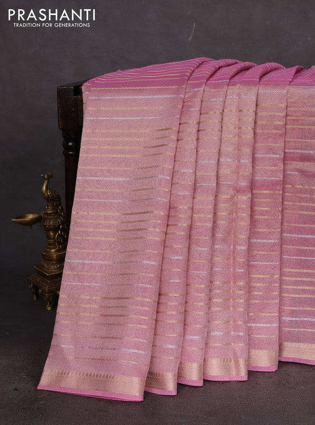 Tissue silk saree light pink with allover silver & gold zari weaves and zari woven border
