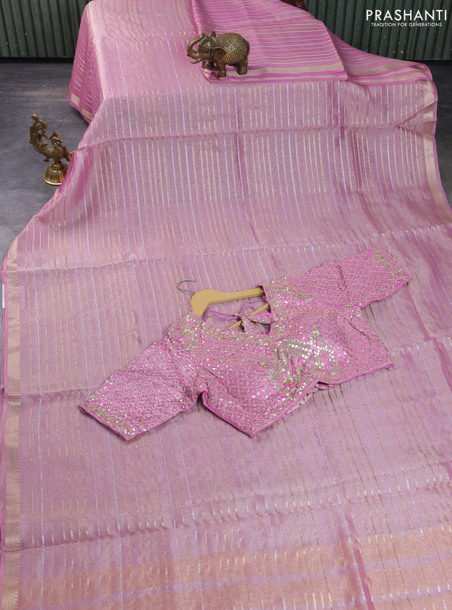 Tissue silk saree light pink with allover silver & gold zari weaves and zari woven border