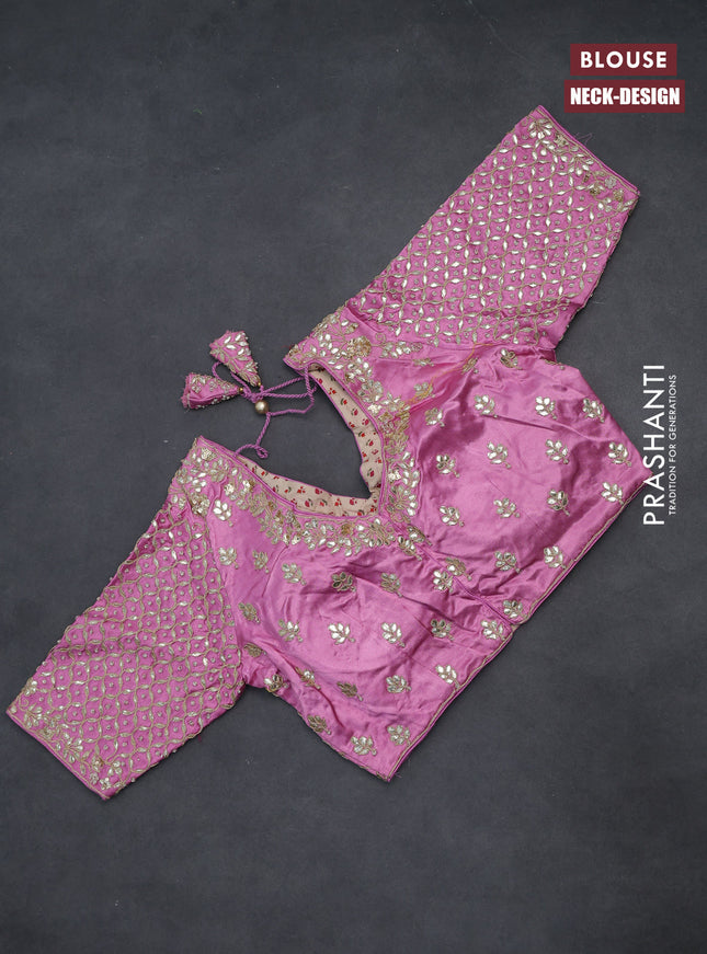 Tissue silk saree light pink with allover silver & gold zari weaves and zari woven border