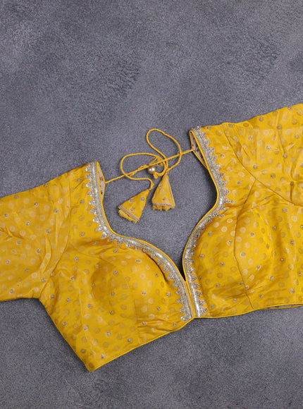 Banarasi silk saree yellow with allover zari woven brocade weaves and lace work border