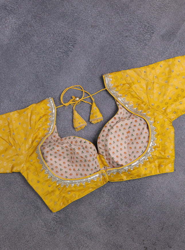 Banarasi silk saree yellow with allover zari woven brocade weaves and lace work border