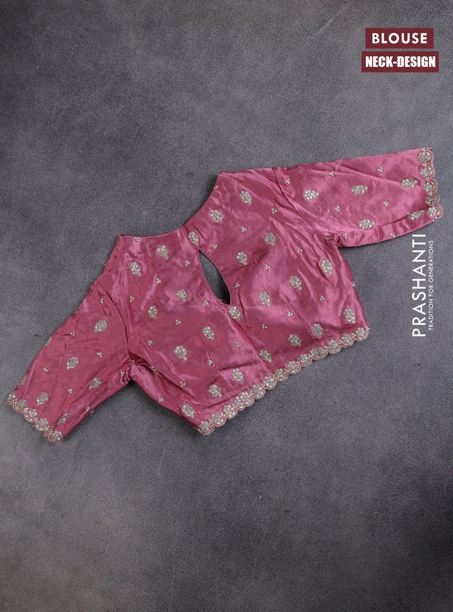 Munga tussar silk saree mauve pink with allover zari weaves & mirror work and lace work border