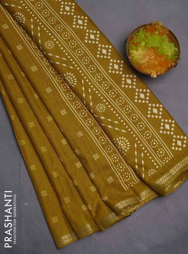 Semi raw silk saree mustard yellow with butta prints and zari woven border