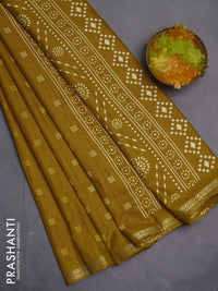 Semi raw silk saree mustard yellow with butta prints and zari woven border
