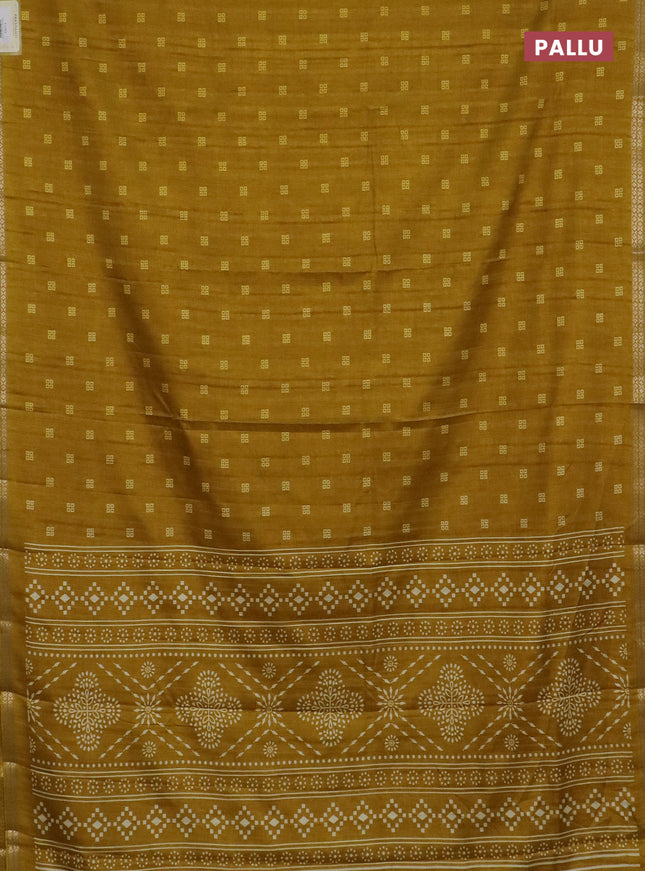 Semi raw silk saree mustard yellow with butta prints and zari woven border