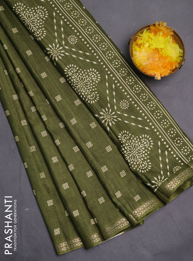 Semi raw silk saree sap green with butta prints and zari woven border