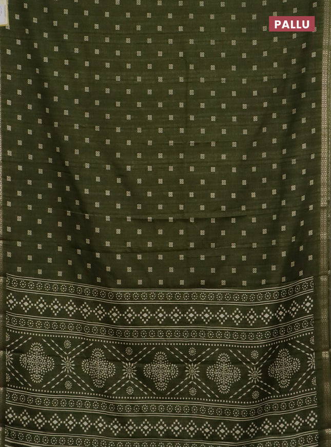 Semi raw silk saree sap green with butta prints and zari woven border