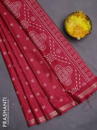 Semi raw silk saree reddish pink with butta prints and zari woven border