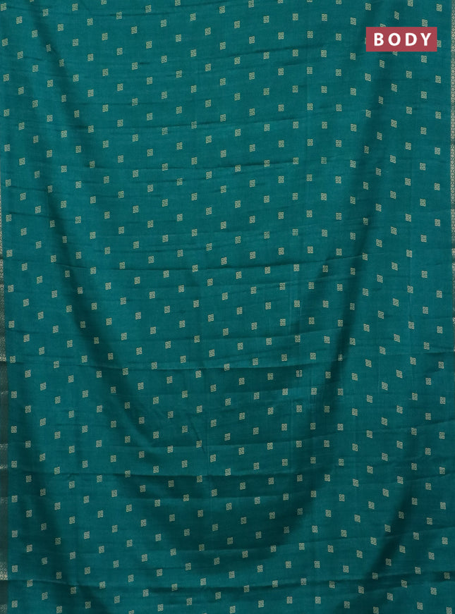 Semi raw silk saree teal green with butta prints and zari woven border