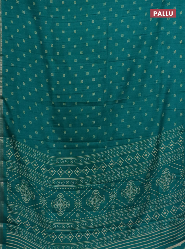 Semi raw silk saree teal green with butta prints and zari woven border