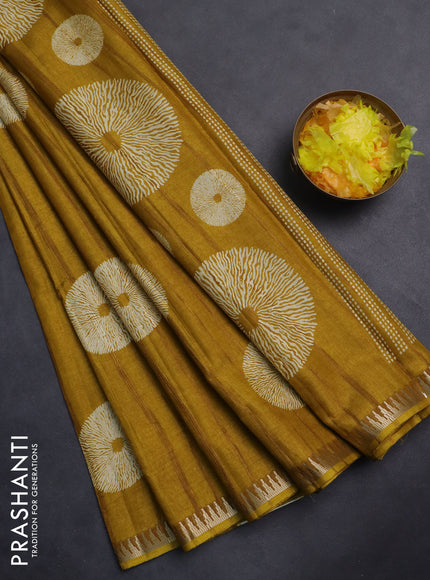 Semi raw silk saree mustard yellow with butta prints and temple design zari woven border