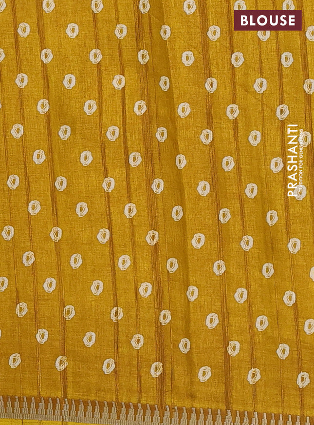 Semi raw silk saree mustard yellow with butta prints and temple design zari woven border