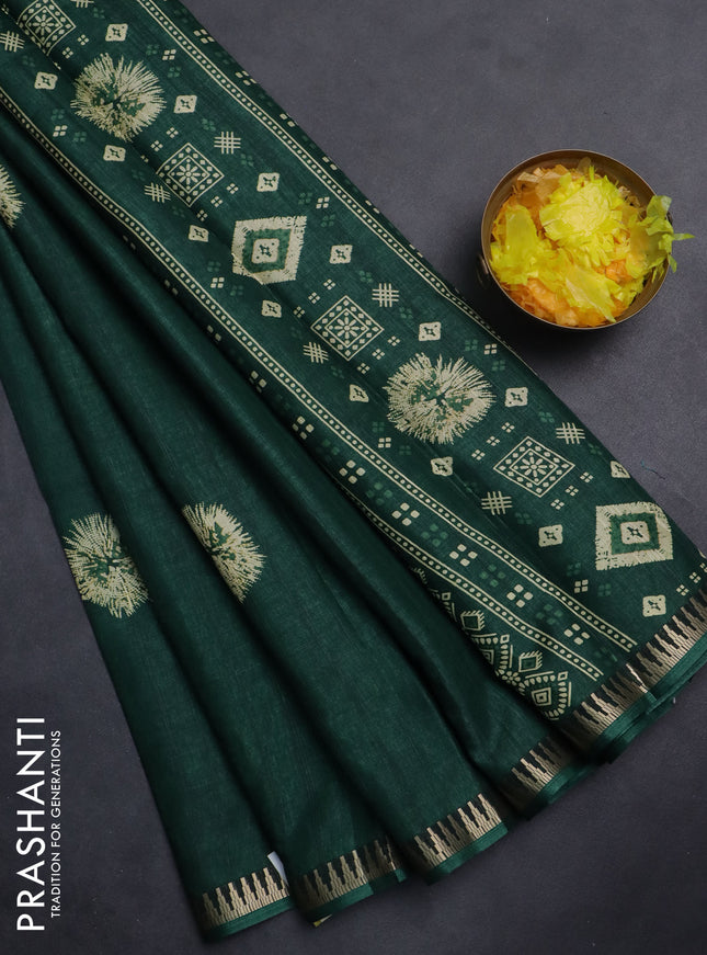 Semi raw silk saree dark green with butta prints and temple design zari woven border