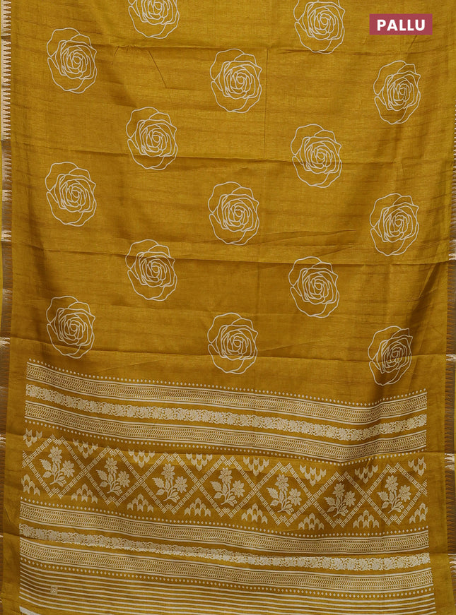 Semi raw silk saree mustard yellow with floral butta prints and temple design zari woven border