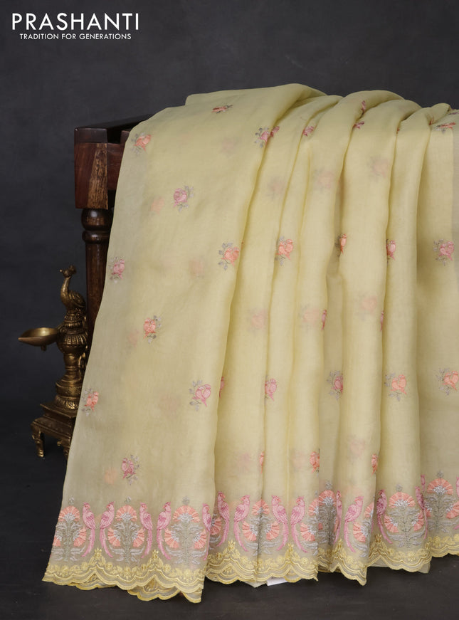 Pure organza silk saree lime yellow with embroidery buttas and embroidery border