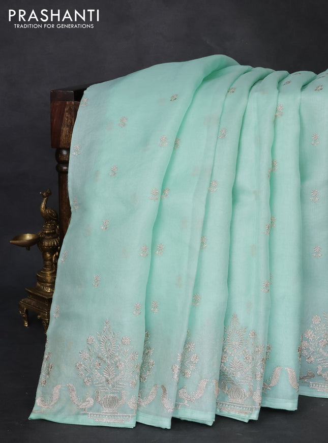 Pure organza silk saree teal green with embroidery buttas and embroidery border
