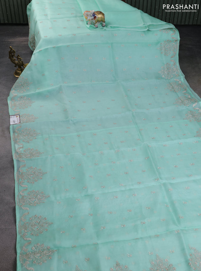 Pure organza silk saree teal green with embroidery buttas and embroidery border