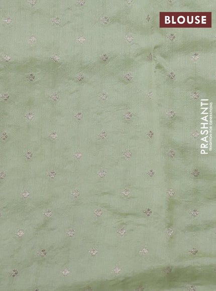 Pure organza silk saree pista green with embroidery buttas and embroidery border