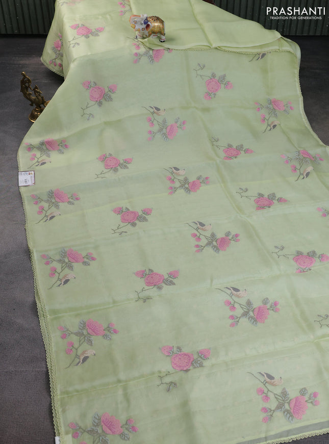 Pure organza silk saree pista green with allover floral embroidery and lace woven border