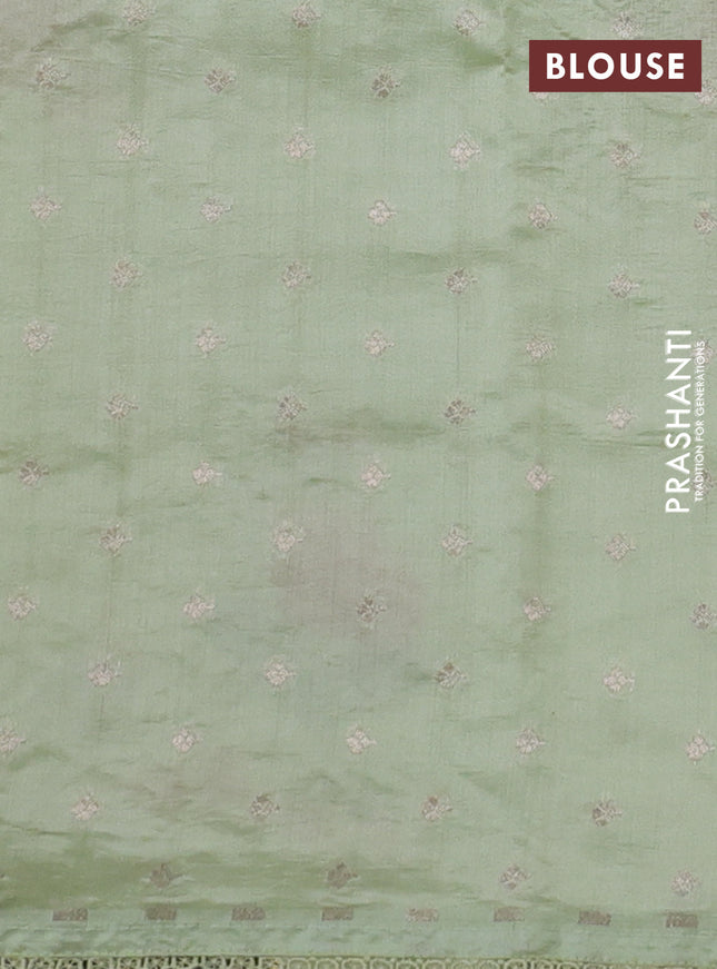 Pure organza silk saree pista green with allover floral embroidery and lace woven border