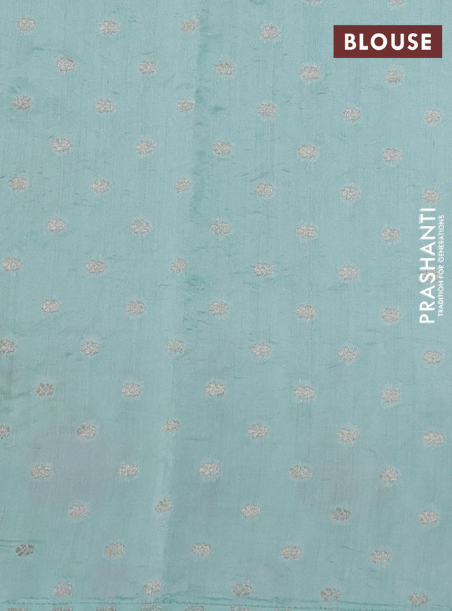 Pure organza silk saree teal green with allover embroidery and floral embroidery border