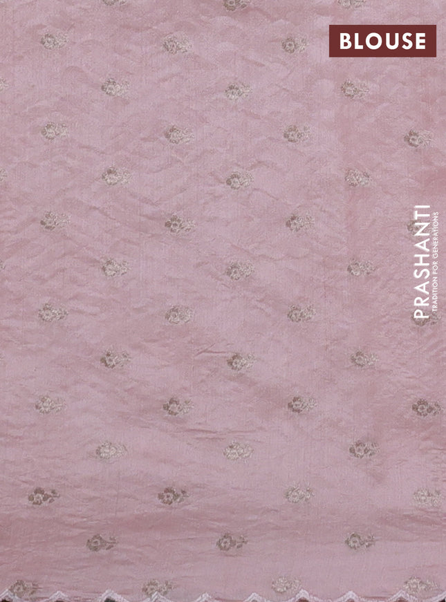 Pure organza silk saree mild peach with allover embroidery and scallop border