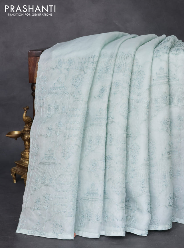 Pure organza silk saree pastel blue with allover embroidery in borderless style