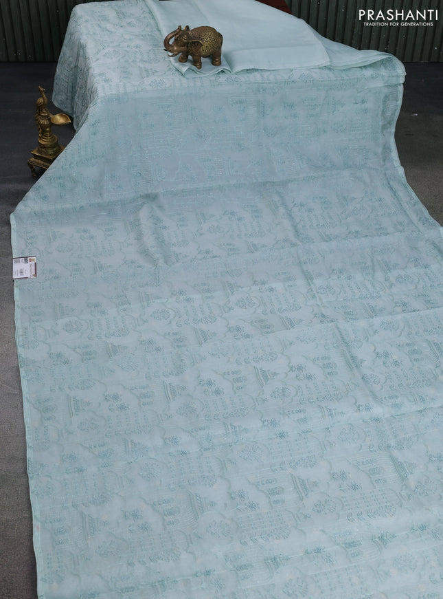 Pure organza silk saree pastel blue with allover embroidery in borderless style