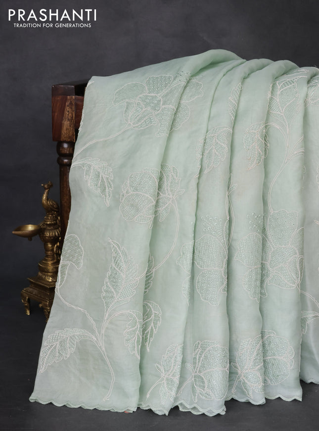 Pure organza silk saree pastel green with floral embroidery and scallop border
