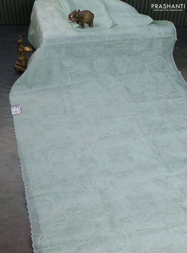 Pure organza silk saree pastel green with floral embroidery and scallop border