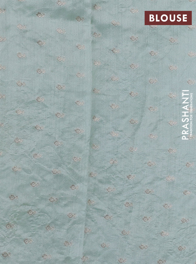 Pure organza silk saree pastel green with floral embroidery and scallop border