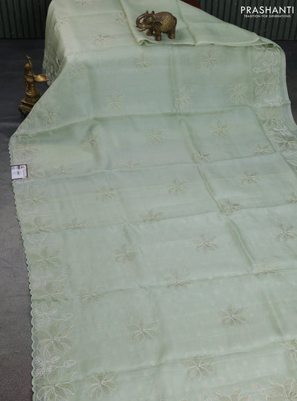 Pure organza silk saree pastel green with floral embroidery and scallop border