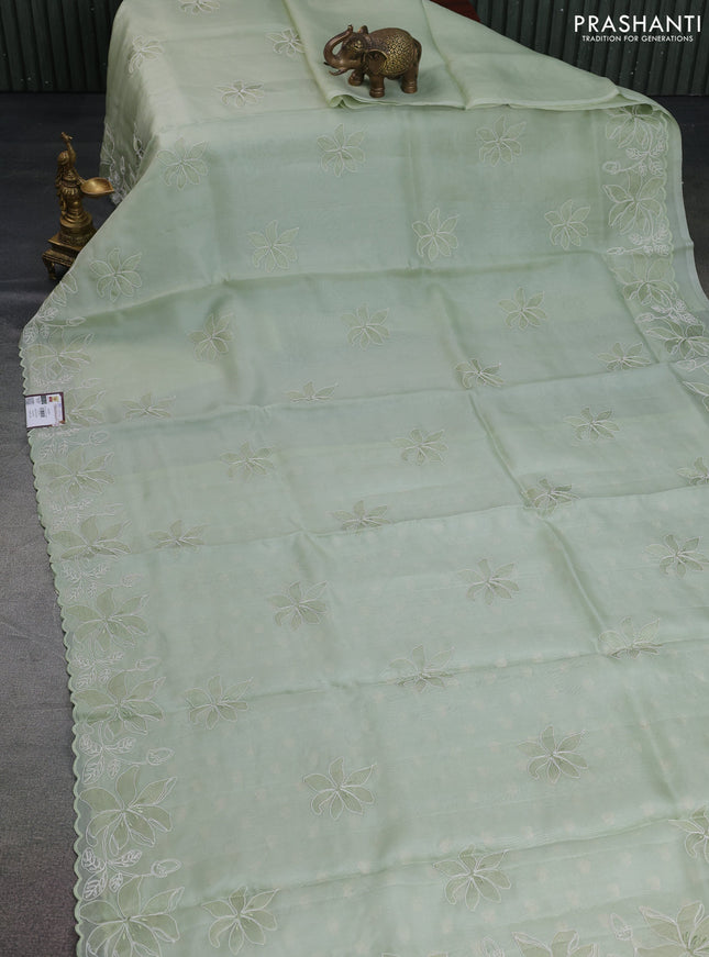 Pure organza silk saree pastel green with floral embroidery and scallop border