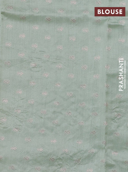 Pure organza silk saree pastel green with floral embroidery and scallop border