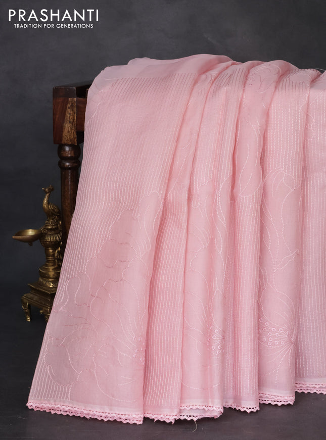 Pure organza silk saree pastel pink with allover embroidery and lace work border