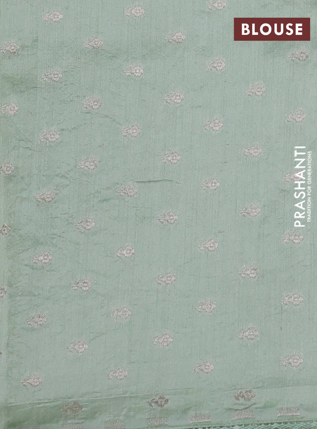 Pure organza silk saree pastel green with allover embroidery and lace work border