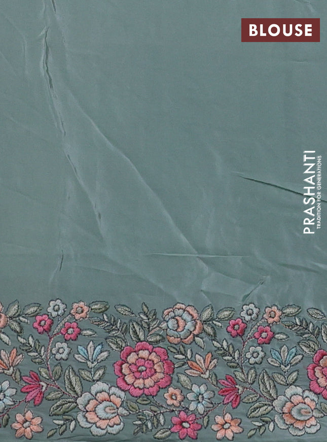 Pure organza silk saree pastel blue shade with allover embroidery and floral embroidery border