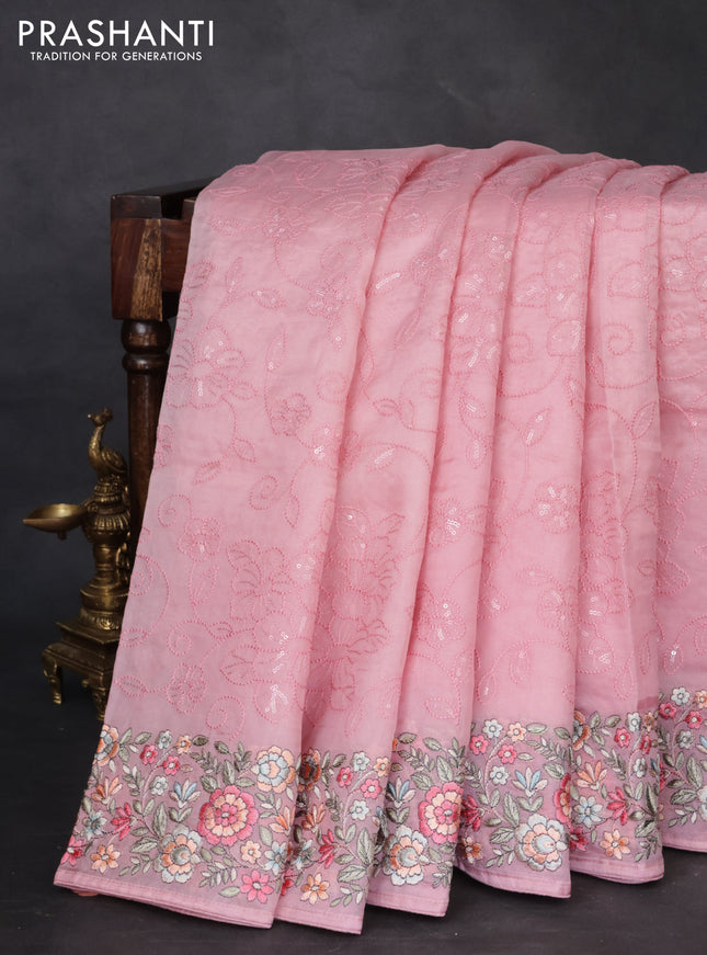 Pure organza silk saree light pink with allover embroidery and floral embroidery border